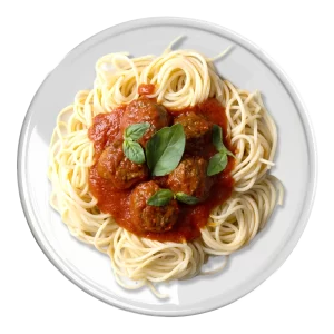 L'image montre une assiette de spaghetti accompagnée de boulettes de viande et nappée de sauce tomate.